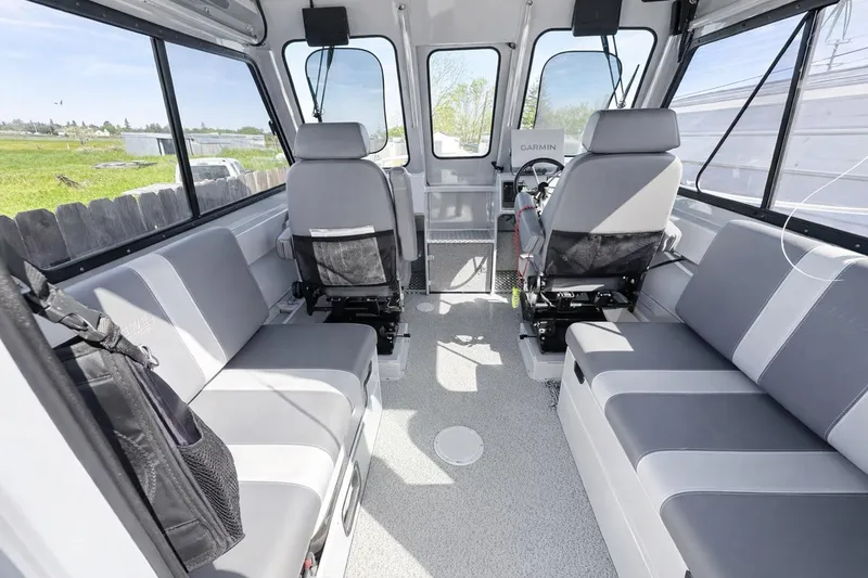 Slide: The Image of Interior of 2022 Hewescraft 220 Ocean Pro ET Hardtop, featuring spacious seating and modern design. - 6