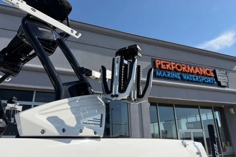 Slide: The Image of 2025 Moomba Makai boat at Performance Marine Watersports dealership. - 13
