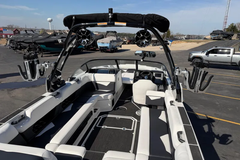 Slide: The Image of 2025 Moomba Makai boat interior with sleek seating and advanced audio system. - 15