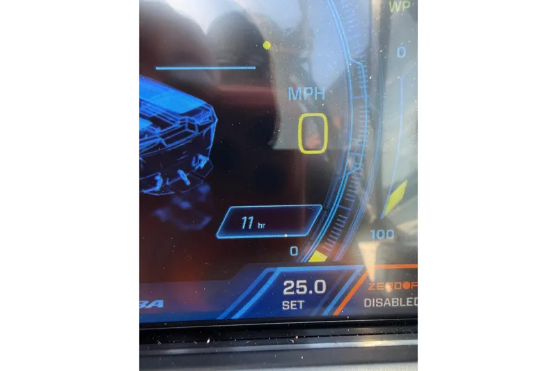 Slide: The Image of Dashboard display of 2025 Moomba Makai showing speed, hours, and settings. - 24