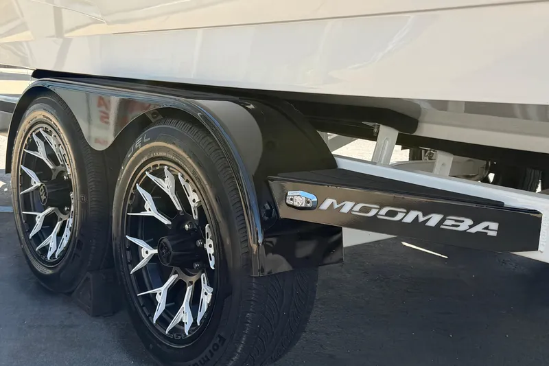 Slide: The Image of 2025 Moomba Makai trailer with stylish wheels and branded fender, showcasing modern design. - 9