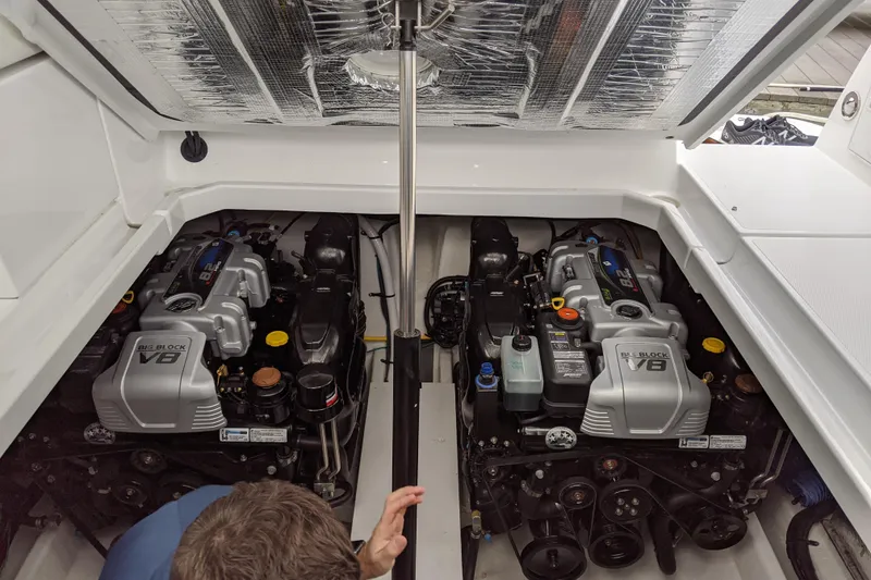 Slide: The Image of 2019 Cruisers Yachts 38 Express engine compartment with dual V8 engines. - 14