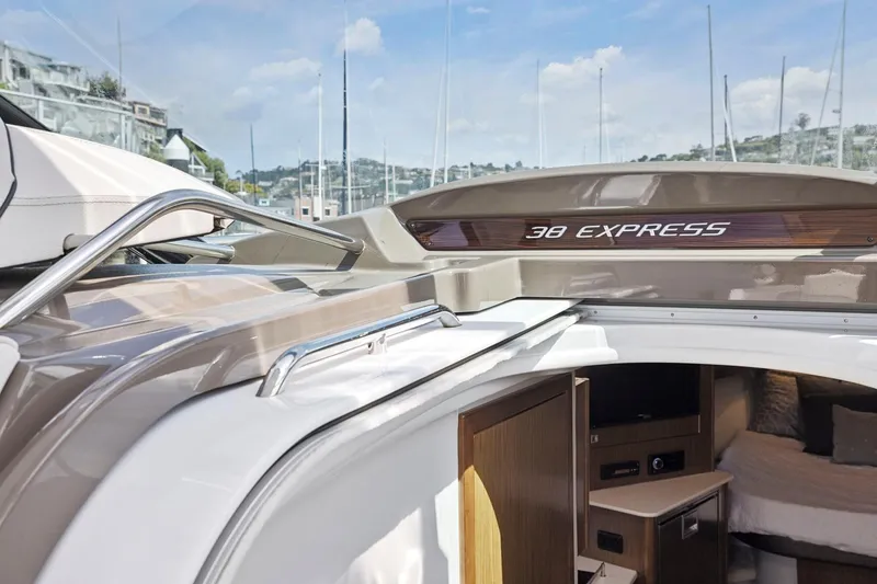 Slide: The Image of 2019 Cruisers Yachts 38 Express interior view with sleek design and modern amenities. - 31