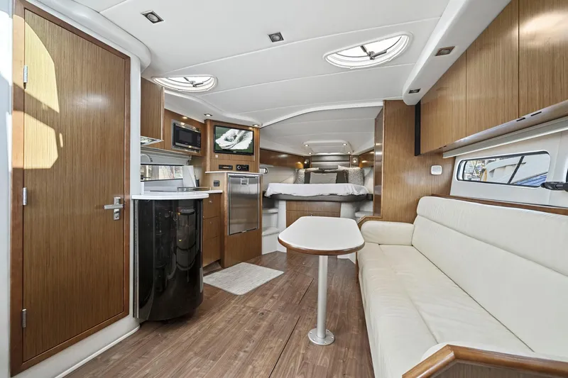 Slide: The Image of Luxurious interior of 2019 Cruisers Yachts 38 Express with modern amenities and elegant design. - 37