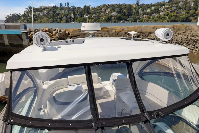Slide: The Image of 2019 Cruisers Yachts 38 Express docked, showcasing sleek design and spacious interior. - 46