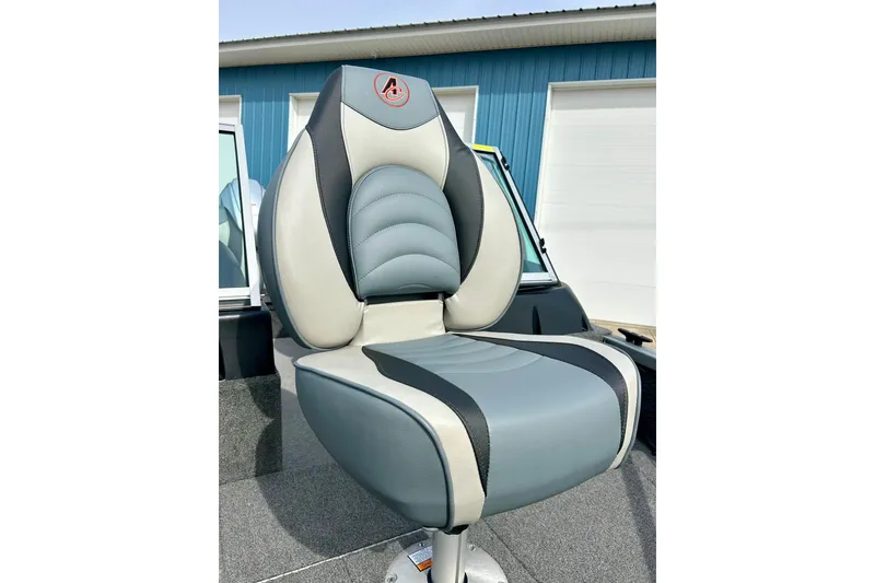 Slide: The Image of 2021 Alumacraft Classic 165 Sport boat seat, gray and white design, outdoor setting. - 19