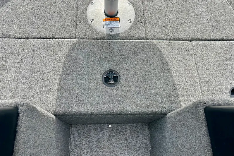 Slide: The Image of Carpeted deck of 2021 Alumacraft Classic 165 Sport boat, featuring a seat mount. - 27