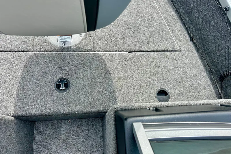 Slide: The Image of 2021 Alumacraft Classic 165 Sport boat interior with gray carpeted flooring. - 31