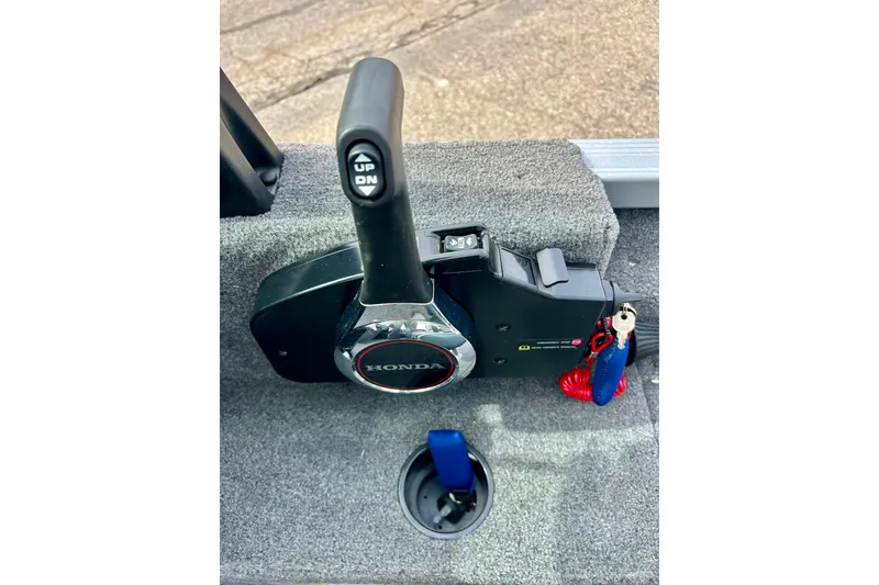 Slide: The Image of 2021 Alumacraft Classic 165 Sport boat control panel with Honda throttle lever. - 36