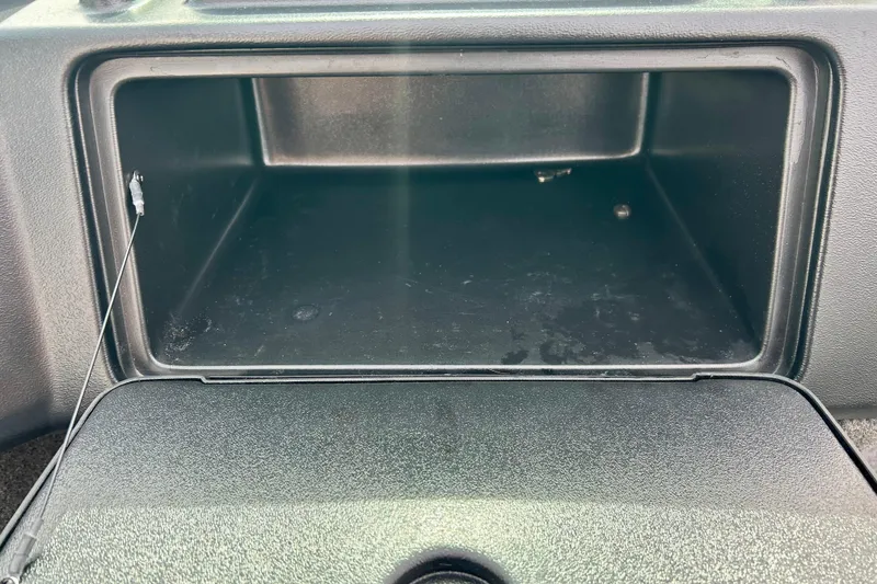 Slide: The Image of Open storage compartment in 2021 Alumacraft Classic 165 Sport boat. - 48