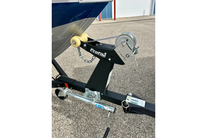 Slide: The Image of Trailer hitch and winch of 2021 Alumacraft Classic 165 Sport boat. - 55