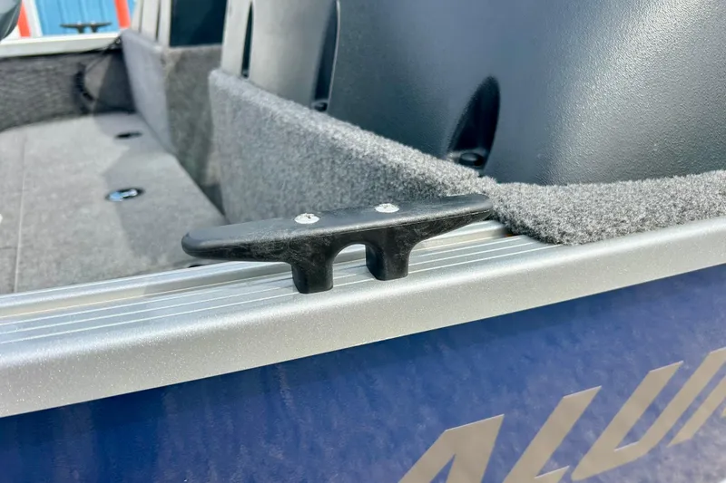Slide: The Image of 2021 Alumacraft Classic 165 Sport boat cleat and interior detail. - 61