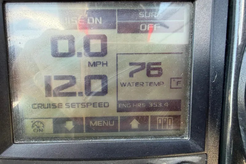 Slide: The Image of Boat dashboard display showing speed, water temperature, and engine hours for 2014 Moomba Mondo. - 18