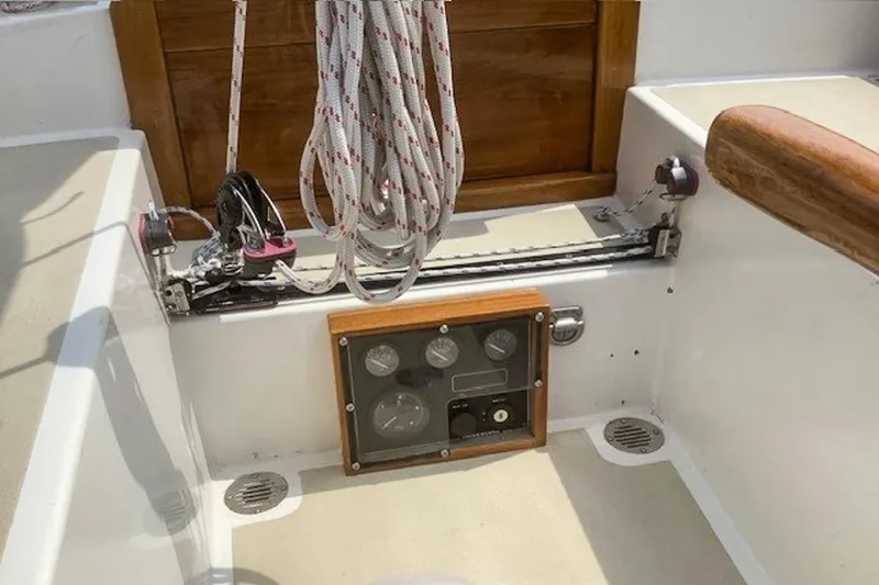 Slide: The Image of Cockpit of 1988 Morris Frances 26 sailboat with ropes and control panel. - 12