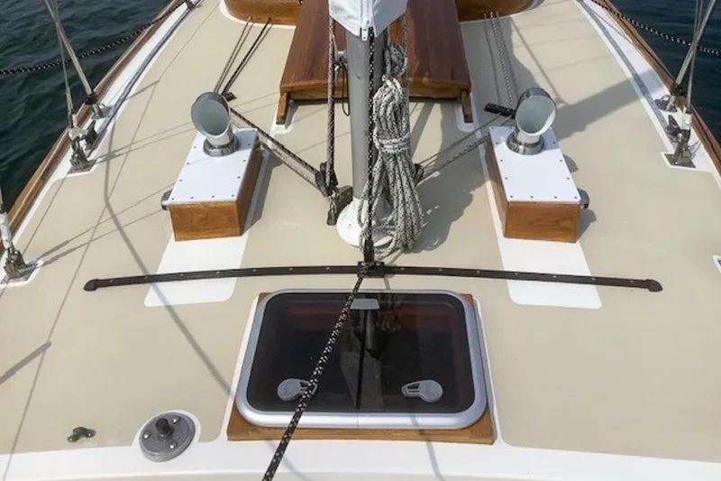 Slide: The Image of Deck of 1988 Morris Frances 26 sailboat with ropes and wooden accents. - 4