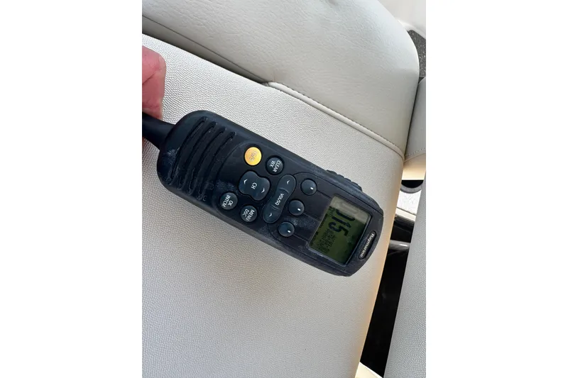 Slide: The Image of Handheld radio on a Boston Whaler 315 Conquest boat, 2016 model. - 77