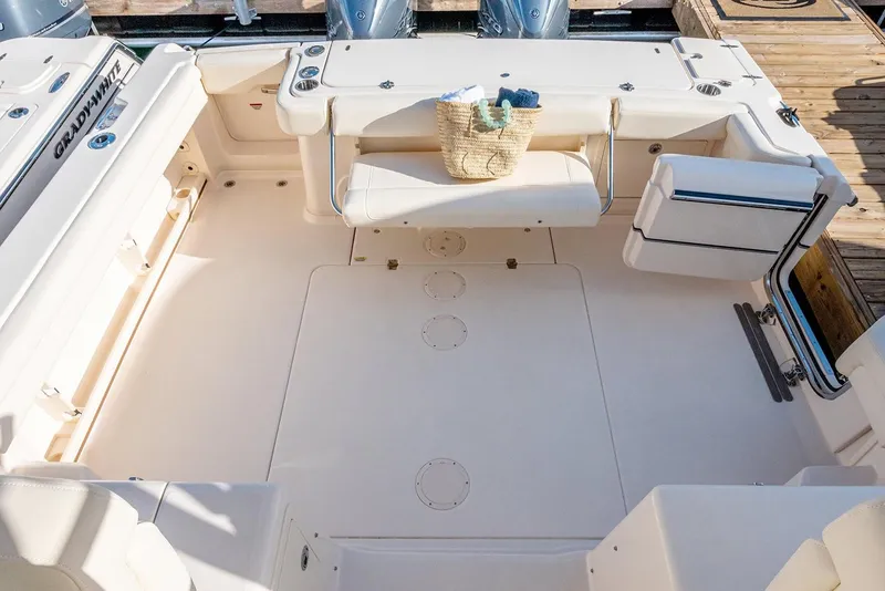 Slide: The Image of Manufacturer Provided Image: 2021 Grady-White Express 330 boat deck with seating and storage compartments. - 12