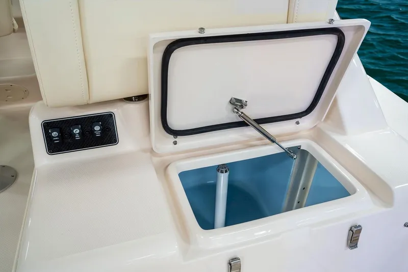 Slide: The Image of Manufacturer Provided Image: Grady-White Express 330 2021 boat storage compartment with open lid. - 15