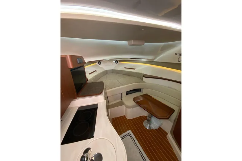 Slide: The Image of Luxurious interior of 2021 Grady-White Express 330 boat with modern amenities and cozy seating. - 18