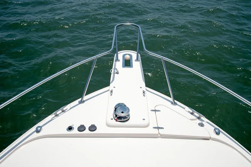 Slide: The Image of Manufacturer Provided Image: Bow of 2021 Grady-White Express 330 boat on water. - 5