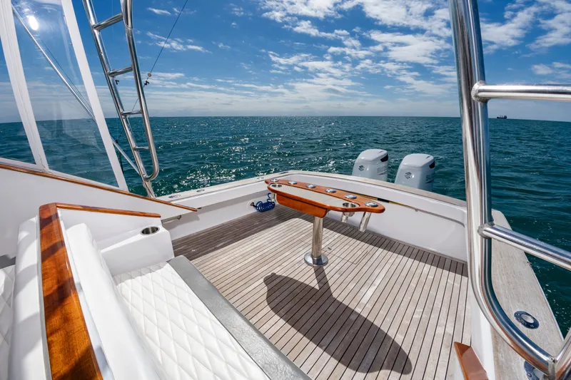 Slide: The Image of 2009 Custom Carolina 36 Express yacht on open sea. - 11