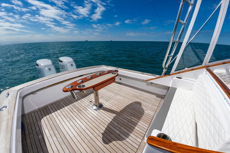 Slide: The Image of Custom Carolina 36 Express 2009 on open sea, luxurious deck design. - 12