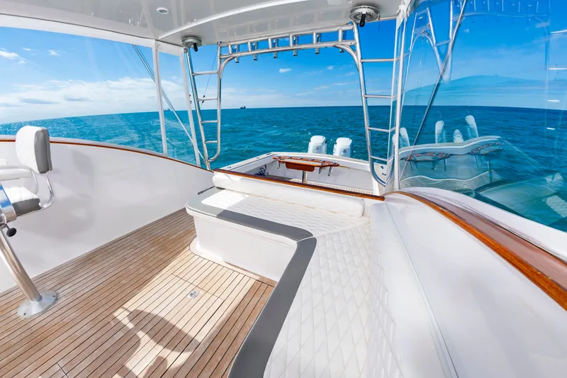 Slide: The Image of Interior of 2009 Custom Carolina 36 Express yacht with ocean view. - 21