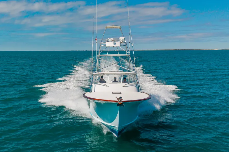 Slide: The Image of Custom Carolina 36 Express 2009 cruising on open sea, splashing water. - 3