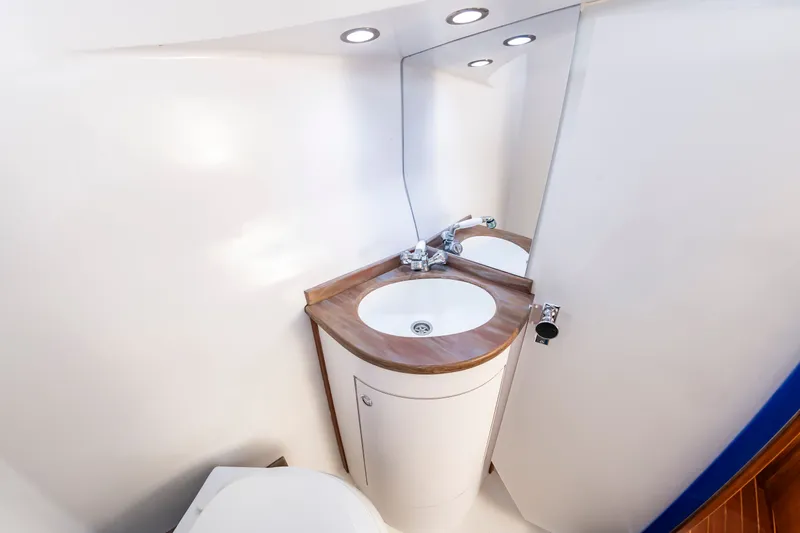 Slide: The Image of Bathroom in Custom Carolina 36 Express boat, year 2009. - 33