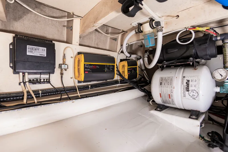 Slide: The Image of Electrical systems in the engine room of the 2009 Custom Carolina 36 Express. - 36