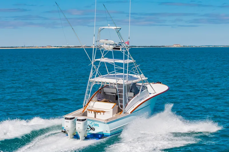Slide: The Image of 2009 Custom Carolina 36 Express boat on open sea. - 41