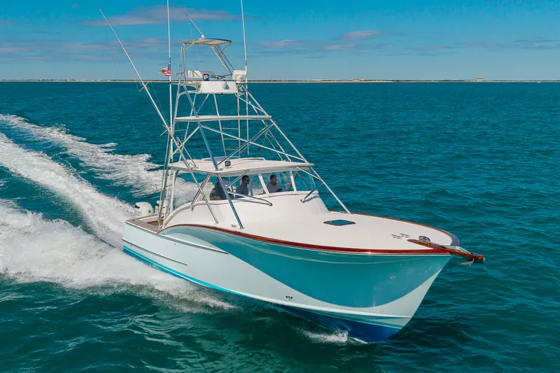 Slide: The Image of 2009 Custom Carolina 36 Express cruising on open sea. - 44