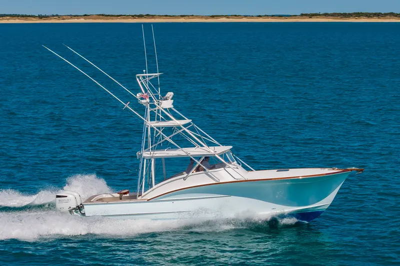 Slide: The Image of 2009 Custom Carolina 36 Express cruising on open sea. - 45