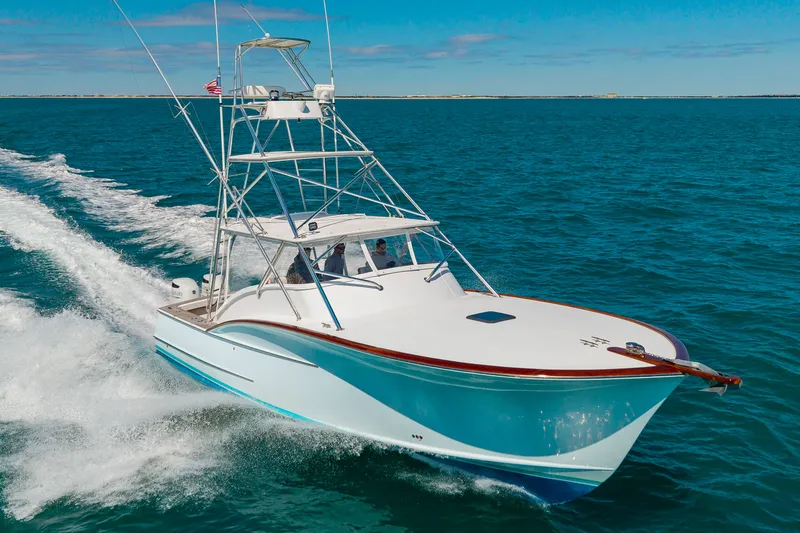 Slide: The Image of 2009 Custom Carolina 36 Express cruising on open sea. - 7