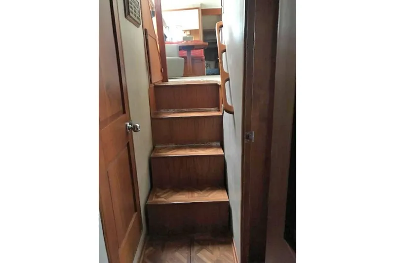 Slide: The Image of Interior wooden stairs on 1985 Chris Craft 500 yacht. - 19
