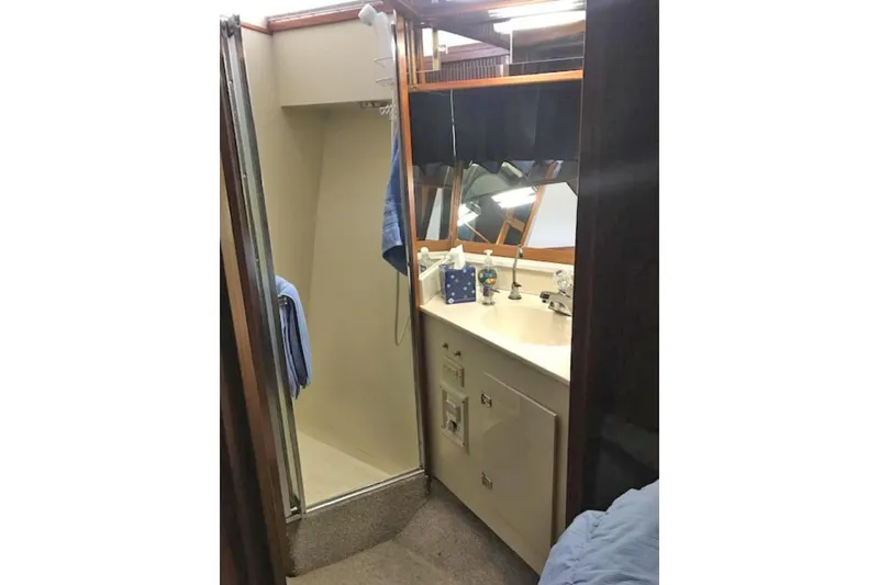 Slide: The Image of Bathroom interior of 1985 Chris Craft 500 yacht with shower and vanity. - 34