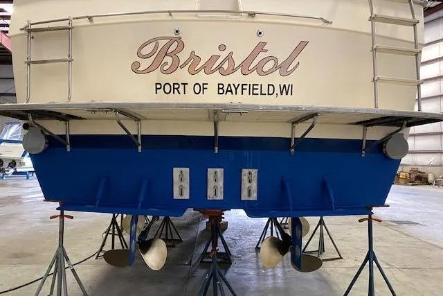 Slide: The Image of 1985 Chris Craft 500 boat named "Bristol" in a Bayfield, WI port warehouse. - 45