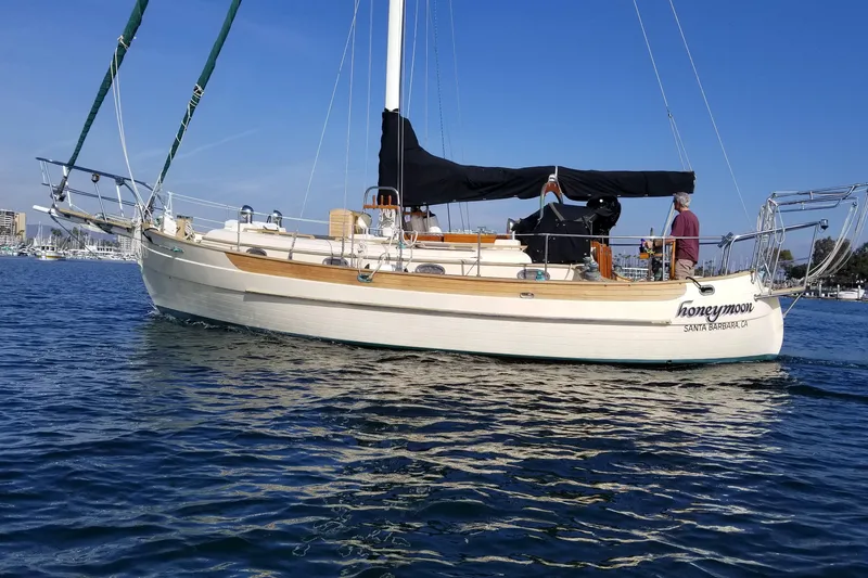 The Image of 1987 Hans Christian 33 sailboat named "Honeymoon" on calm water, Santa Barbara, CA. - 0