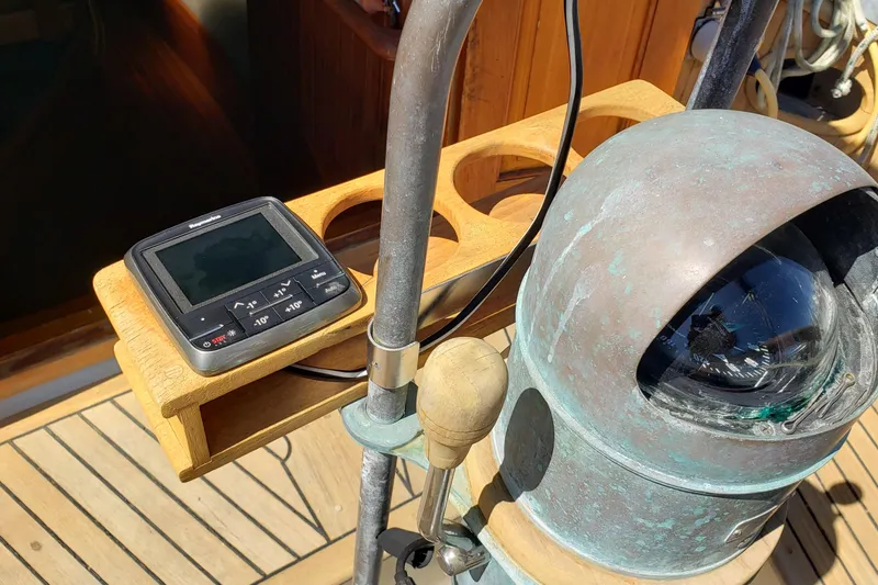 Slide: The Image of Compass and navigation equipment on a 1987 Hans Christian 33 sailboat deck. - 18