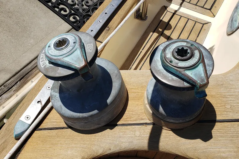 Slide: The Image of Two vintage winches on a 1987 Hans Christian 33 sailboat deck. - 20