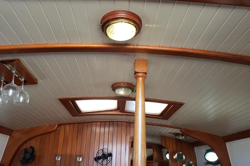 Slide: The Image of Interior of 1987 Hans Christian 33 sailboat with wooden ceiling and skylights. - 25