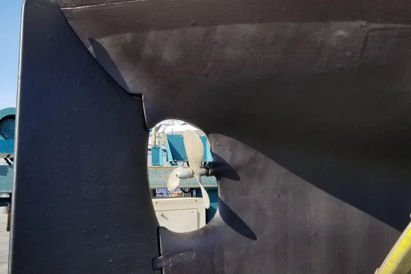 Slide: The Image of Close-up of a 1987 Hans Christian 33 sailboat propeller and rudder. - 68