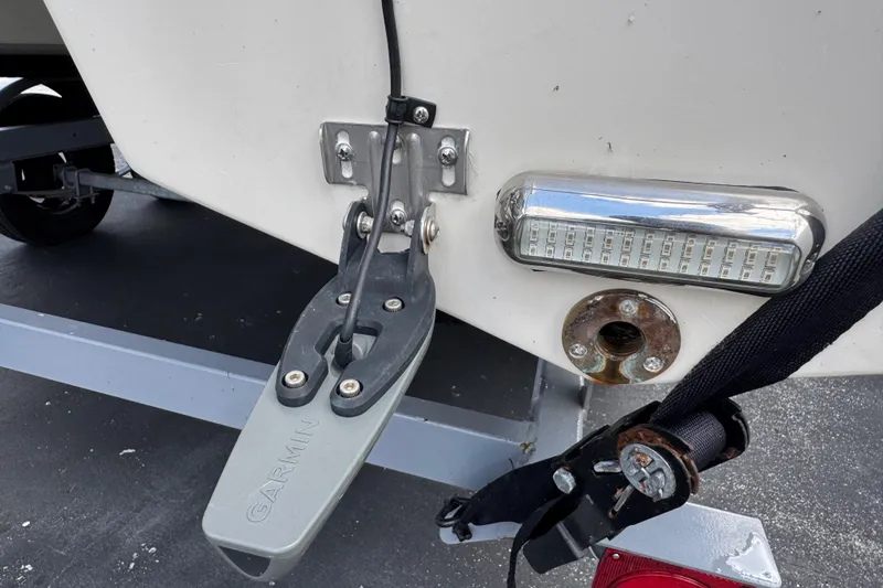 Slide: The Image of Rear view of a 2018 Beachcat 20 boat with Garmin equipment and LED light. - 17