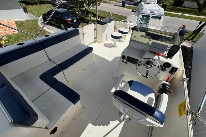 Slide: The Image of Interior of a 2018 Beachcat 20 boat with seating and navigation equipment. - 39
