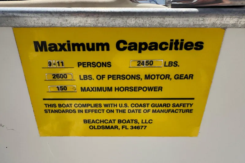 Slide: The Image of Maximum capacity label for Beachcat 20 boat, 2018 model, showing weight and horsepower limits. - 49