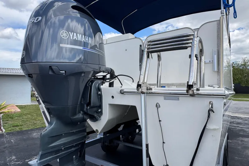 Slide: The Image of 2018 Beachcat 20 boat with Yamaha 150 outboard motor and stainless steel ladder. - 6