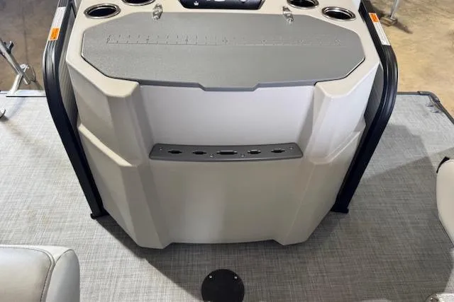 Slide: The Image of 2026 Princecraft Sportfisher 21-2RS boat console with cup holders and storage compartments. - 15