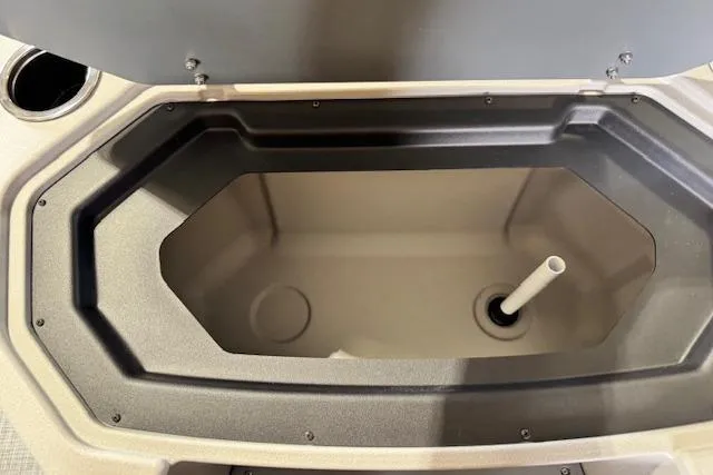 Slide: The Image of Livewell compartment in 2026 Princecraft Sportfisher 21-2RS boat, open lid view. - 18