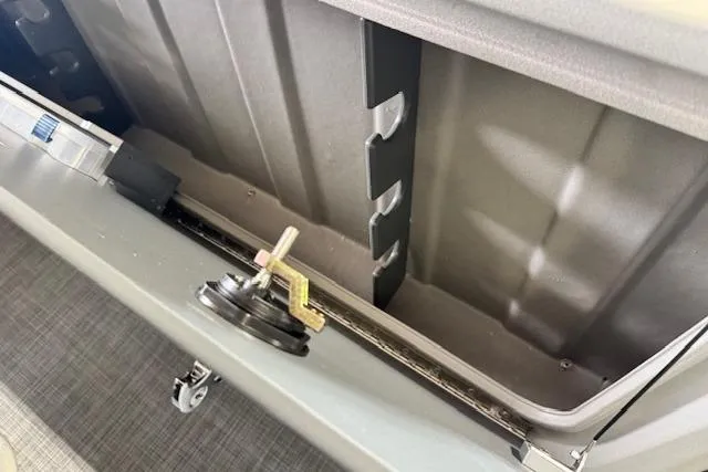 Slide: The Image of Interior view of a 2026 Princecraft Sportfisher 21-2RS boat compartment. - 20