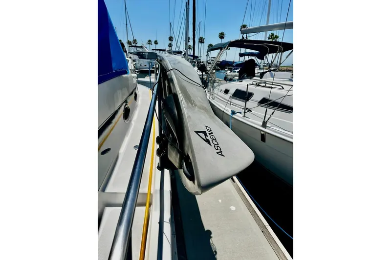 Slide: The Image of Docked 1988 Mediterranean 38 Convertible yacht with Ascend kayak on deck. - 10